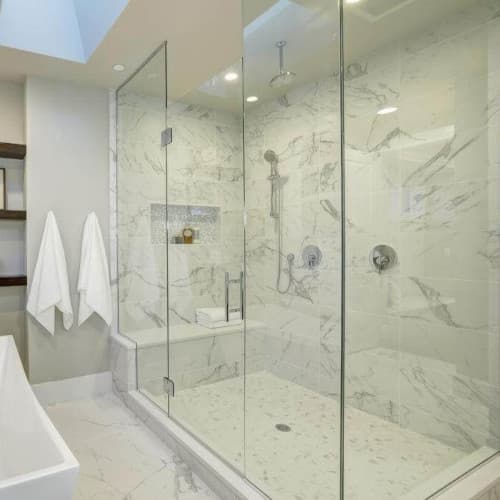 Smartfit Plumbers - Frameless glass shower enclosure with privacy film